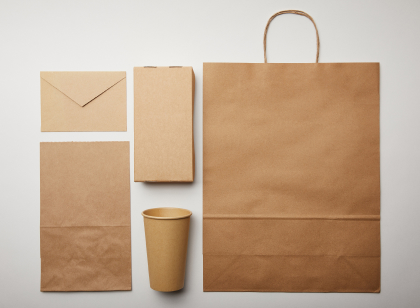 flay lay with envelope paper cup food delivery